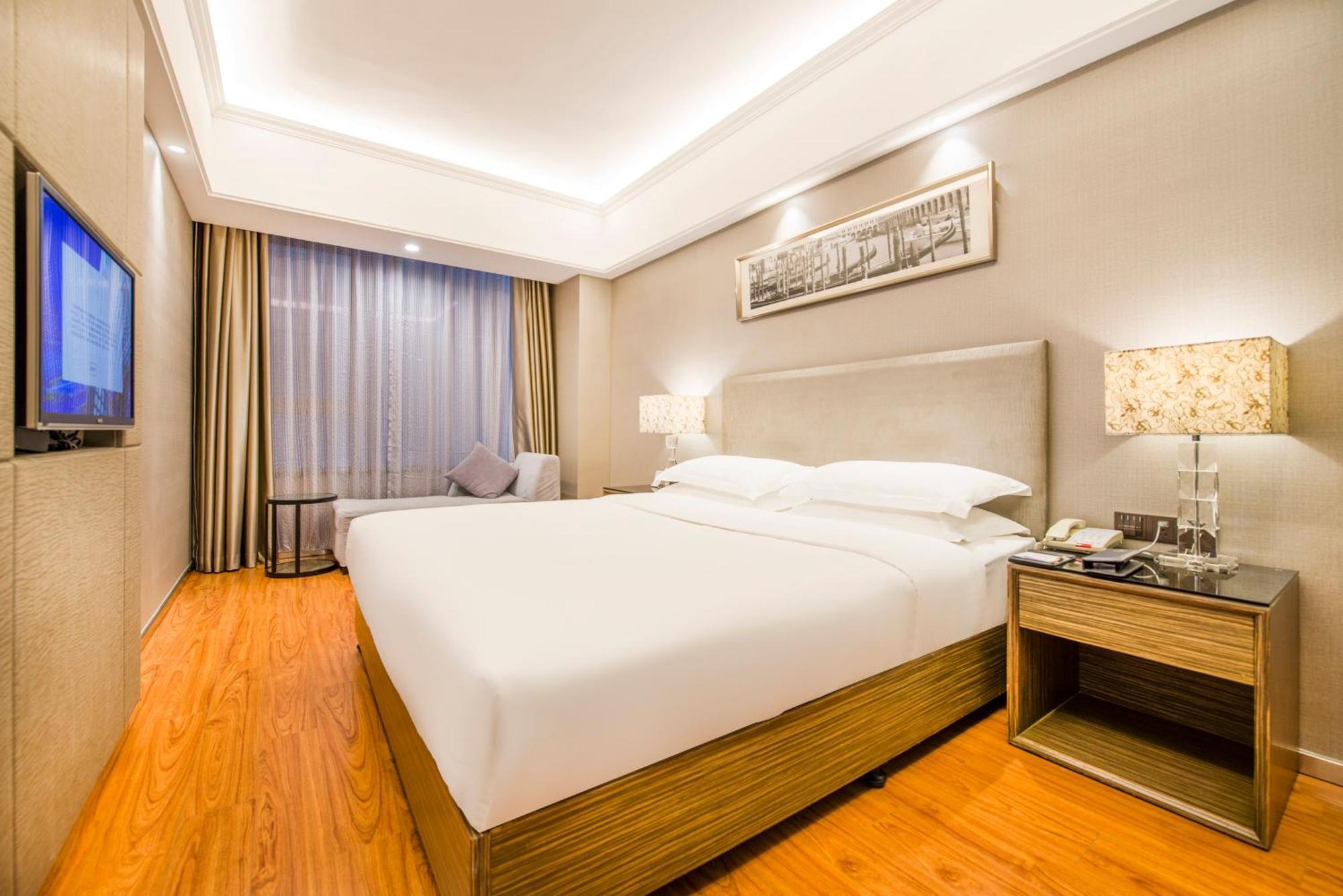 La Perle International Hotel Cantón Habitación foto